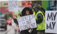  ?? (Lindsey Wasson/Reuters) ?? PEOPLE PROTEST Boeing’s COVID-19 vaccine mandate, outside the company’s facility in Everett, Washington, on Friday.