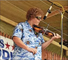  ?? CHRISTINE CLAYTOR - FIDDLE FESTIVAL ?? Andrew Vogts of Chadds Ford won the 2016 Grand Champion Award at the 33rd annual Lyons Fiddle Festival on Sept. 18.