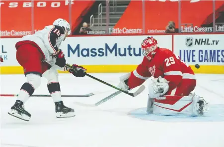  ?? PAUL SANCYA/THE ASSOCIATED PRESS ?? Pierre-luc Dubois beats Red Wings goalie Thomas Greiss on Monday for his lone goal this season. Dubois, a former No. 3 pick who scored 27 goals a couple of years ago and led the Blue Jackets in playoff scoring last season, has demanded a trade out of Columbus.