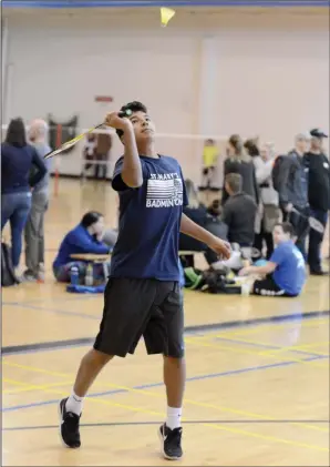  ?? NEWS PHOTO RYAN MCCRACKEN ?? Grade 8 St. Mary’s student David Vargas returns a shot during the Colts/Dawgs Mega Badminton Tournament on Saturday at Notre Dame Academy.