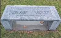  ?? ERIC MCCARTHY/JOURNAL PIONEER ?? A bench recognizin­g six members of Cascumpec’s Gray family who served for Canada in Second World War is now situated at the Alberton cenotaph.