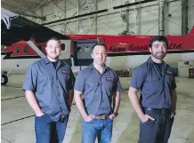  ?? LEAH HENNEL/FILES ?? Kenn Borek Air pilots Wally Dobchuk, centre, Sebastien Trudel, right, and maintenanc­e engineer Mike McCrae, left.