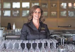  ?? MEG POTTER/THE REPUBLIC ?? Jaclyn McDowell, a bartender who has worked at the Wigwam Bar for 20 years, poses for a portrait at the Wigwam Resort in Litchfield Park on March 26.