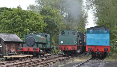  ?? TOBY JENNINGS/SR ?? Three for the price of one at the Colne Valley Railway on May 28. On the left, Andrew Barclay 0-4-0ST Works No. 1931 has arrived on loan from Rocks by Rail, while on the right is the Mid-Hants Railway’s converted Hunslet ‘Austerity’ Works No. 3781,...