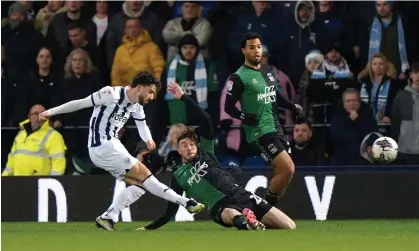  ?? ?? Mikey Johnston scores West Brom’s opener as the Baggies saw off Coventry. Photograph: Bradley Collyer/PA