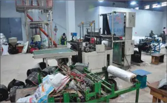  ??  ?? Artisans and entreprene­urs at work at the Edo Production Centre, in Benin City, Edo State