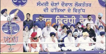  ?? BHARAT BHUSHAN/HT ?? SAD chief Sukhbir Singh Badal addressing the ‘Jabar Virodh’ rally in Patiala on Sunday. Party patriarch Parkash Singh Badal (extreme right) and other senior party leaders are also seen.