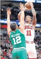  ?? USA TODAY SPORTS ?? Bulls forward DeMar DeRozan shoots against Celtics forward Grant Williams.