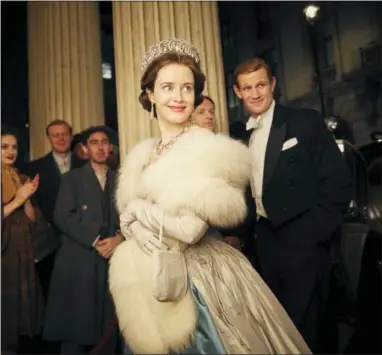  ?? ROBERT VIGLASKY — NETFLIX VIA AP ?? This image released by Netflix shows Claire Foy, center, and Matt Smith, right, in a scene from “The Crown.” The New York Times website recaps each episode of “The Crown” in text stories, but it goes the extra mile. Through the miracle of hyperlinks...