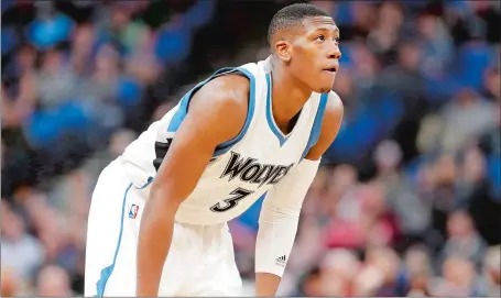  ?? AP FILE PHOTO ?? After spending just one season in Minnesota, ex-New London great Kris Dunn is on the move to Chicago after the Bulls dealt three-time NBA All-Star Jimmy Butler to the Timberwolv­es on Thursday night as part of a multi-player trade that also included Dunn.