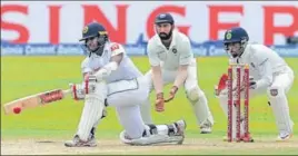  ?? AFP ?? Cheteshwar Pujara (centre) has been exceptiona­l with his closein fielding in the Sri Lanka series.