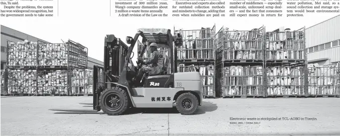  ?? WANG JING / CHINA DAILY ?? Electronic waste is stockpiled at TCL-AOBO in Tianjin.