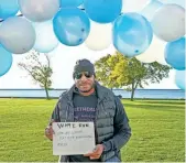  ?? ?? Michael Washington at the Let Them Live annual domestic violence awareness 5K walk-run in Milwaukee on Oct. 7.
