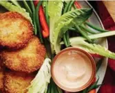  ??  ?? These fried green tomatoes, served with a paprika dip, make for the perfect autumn appetizer.