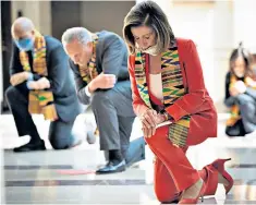  ??  ?? Nancy Pelosi and fellow Democrats wear Kente shawls to honour George Floyd