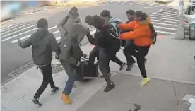  ??  ?? Vicious attack by teen mob last week on a 15-year-old girl in Crown Heights, Brooklyn was caught on video.