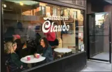  ?? BETH J. HARPAZ — THE ASSOCIATED PRESS ?? This photo shows Patisserie Claude, a tiny bakery that sells individual quiches, croissants and other goodies in the Greenwich Village neighborho­od of New York. While the Village has gentrified over the years like so many Manhattan neighborho­ods, one can still find plenty of mom-and-pop shops and hole-in-the-wall cafes amid the meandering side streets.