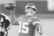  ?? CHARLIE RIEDEL AP ?? Chiefs quarterbac­k Patrick Mahomes will face a tough test today against the Dolphins’ defense.