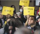  ?? Irfan Khan Los Angeles Times ?? LANDLORDS HOLD signs calling for an end to eviction protection­s at L.A. City Hall in October.