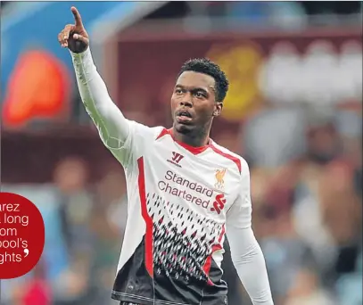  ??  ?? n Daniel Sturridge celebrates after scoring the only goal of the game to seal three points for Liverpool.