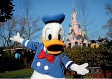  ?? PHOTO: REUTERS ?? Disney actors who dress up as famous characters like Donald have won millions in unpaid wages.