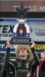  ?? LARRY PAPKE — THE ASSOCIATED PRESS ?? Ryan Blaney celebrates in victory lane after winning the NASCAR XFinity series auto race in Fort Worth, Texas, Saturday.