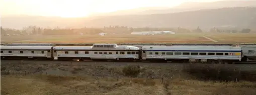  ?? Russ Grycan ?? A buffer coach follows the Park observatio­n car on the westbound Canadian near Kamloops, British Columbia, on Oct. 19, 2022.