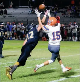  ??  ?? CIBOLA’S GABRIEL RAMIREZ (12) breaks up a pass intended for Mesa-Westwood’s Will Driggs during the first quarter of Friday night’s game at Raider Field.