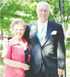  ??  ?? Louise Lortie Séguin, seen with her husband John Jolie, died Saturday morning after her car plunged off the broken edge of a washed-out road.