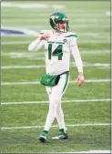  ?? Stew Milne / Associated Press ?? The Jets have until May to exercise the fifth-year option on quarterbac­k Sam Darnold, worth $25 million fully guaranteed.