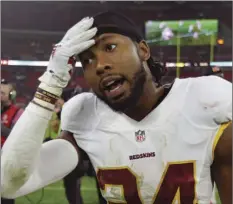  ??  ?? In a Oct. 30, 2016, file photo, Washington Redskins cornerback Josh Norman leaves the field after an NFL Football game against the Cincinnati Bengals at Wembley Stadium in London. The NFL has establishe­d a player-owner committee focusing on social and...