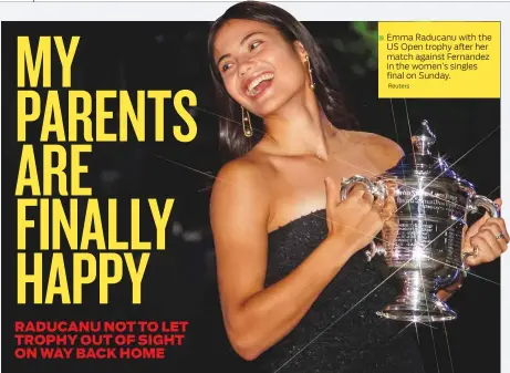  ?? Reuters ?? Emma Raducanu with the US Open trophy after her match against Fernandez in the women’s singles final on Sunday.