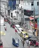  ?? REUTERS ?? Vehicle owners wait in a queue to buy petrol in Colombo.