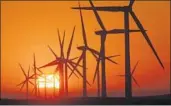  ?? Bob Chamberlin Los Angeles Times ?? UNDER SB 100, California must obtain its electricit­y from clean sources, such as wind, by 2045.