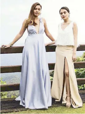  ??  ?? Nicole Thorpe and Rosanna Periquet wear Dani’s gowns for a garden wedding.