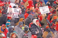  ?? REED HOFFMANN/ASSOCIATED PRESS FILE PHOTO ?? Chiefs fans who braved subzero temperatur­es celebrate after a touchdown against the Dolphins on Jan. 13 in Kansas City, Mo.