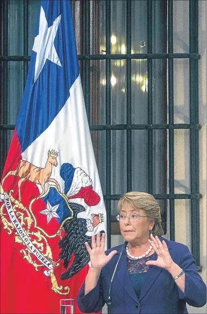  ?? CLAUDIO REYES/AFP ?? La presidenta de Chile Michelle Bachelet en una conferenci­a de prensa en la que habló de la reforma fiscal