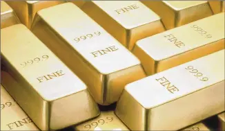  ?? NEW YORK TIMES ?? While bullion has rallied amid both risk-on and risk-off episodes, it could suffer from further profit-taking amid the sharp declines in stocks, a precious metals analyst at Standard Chartered Bank said.