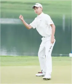  ?? — AFP photo ?? Kuang reacts after a putt during the second round of the China Open in Shenzhen, in China’s southern Guangdong province.