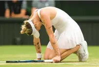  ?? ?? Marketa Vondrousov­a celebrates winning match point against Elina Svitolina during the Wimbledon women’s singles semifinal Thursday in London.