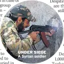  ??  ?? UNDER SIEGE A Syrian soldier