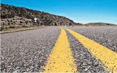  ?? DREAMSTIME ?? The easiest solution to clean paint off your vehicle from a fresh traffic line is to spray the fender liners in the wheel wells with black paint.