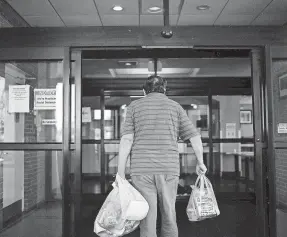  ?? CHRISTOPHE­R CAPOZZIELL­O FOR USA TODAY ?? David Lamay was recently homeless but now lives in a Best Western hotel while he waits for housing through the state. Lamay receives assistance from Community Health Resources.