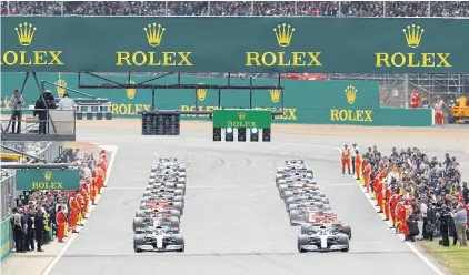  ?? REUTERS ?? Cars take part in the 2019 British Grand Prix at Silverston­e.