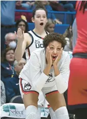  ?? CLOE POISSON/SPECIAL TO THE COURANT ?? Amari Deberry, front, and Lou Lopez Senechal react after a technical foul was called against Uconn in the second half against St. John’s on Tuesday at the XL Center in Hartford.