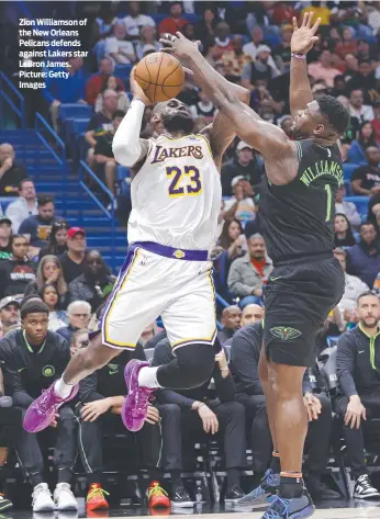  ?? ?? Zion Williamson of the New Orleans Pelicans defends against Lakers star LeBron James. Picture: Getty Images