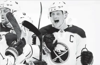  ?? ASSOCIATED PRESS FILE PHOTO ?? Buffalo Sabres captain Jack Eichel celebrates his game-winning overtime goal against the Penguins in Pittsburgh on Nov. 19. The Sabres are on such a roll, Eichel was having difficulty recalling the last time they lost.