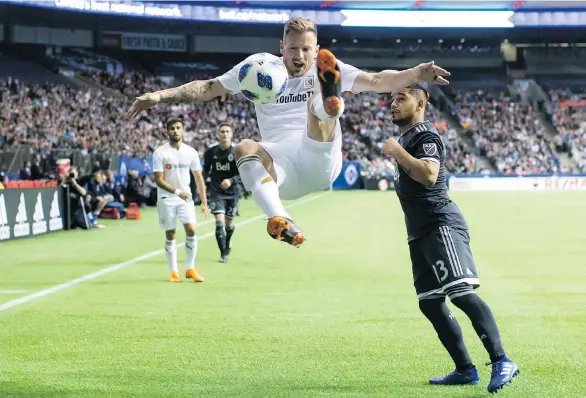  ?? DARRYL DYCK/THE CANADIAN PRESS/FILES ?? Los Angeles FC defender Jordan Harvey, who spent 2011-2017 with the Caps, has been a crucial contributo­r to his new team’s defensive scheme.