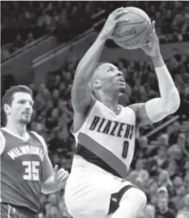  ??  ?? Trail Blazers star Damian Lillard, a product of Big Sky Conference member Weber State, is being paid $24.3 million this season. The Associated Press