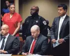  ?? COMMERCIAL APPEAL ?? Sherra Wright, left, glances at her new court-appointed attorney Juni Ganguli, right. MARK WEBER/THE